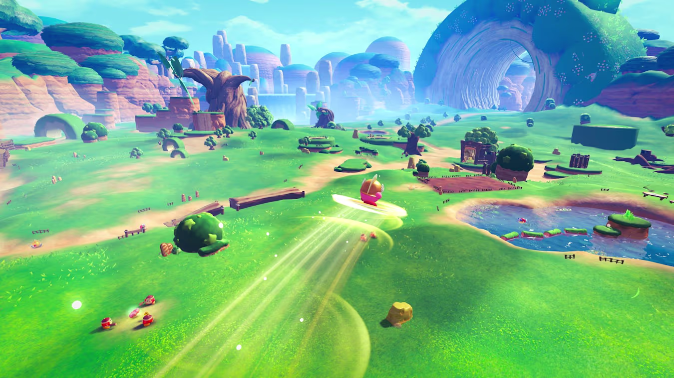 A screenshot from Kirby and the World Beyond, showing Kirby gliding atop a Cutter blade through an open environment.